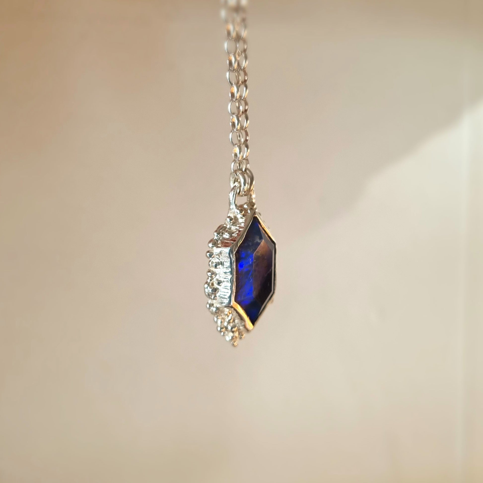 silver seafoam pendant with a black opal by elizabeth french jewellery